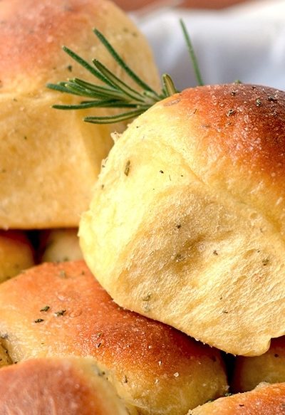 This versatile and delicious recipe will make your holiday dinner prep so much easier! This dough not only makes fabulous Rosemary Sweet Potato Rolls, but it can also be used as pizza dough!