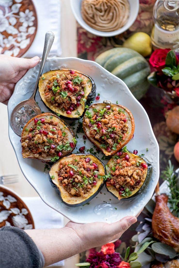 stuffed acorn squash with quinoa, pomegranates and walnuts