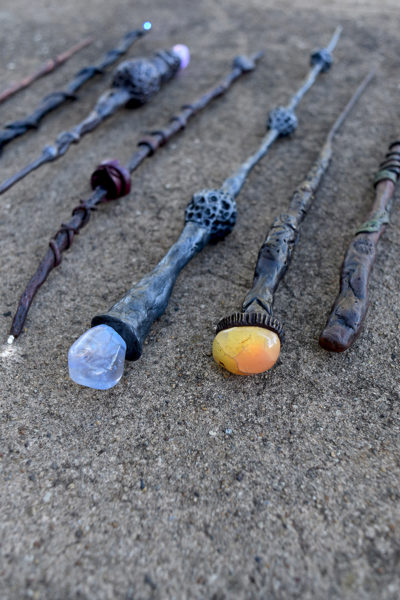 Harry Potter wands on cement